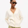 Cardigan in maglia larga con ricamo “Kenzo Signature” in misto cotone e lana Cardigan in maglia larga con ricamo “Kenzo Signature” in misto cotone e lana