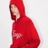 Felpa con cappuccio ricamata “Kenzo Winter Holidays” in cotone e lana Felpa con cappuccio ricamata “Kenzo Winter Holidays” in cotone e lana