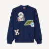 Maglione ricamato “Kenzo Badges” in misto cotone e lana Maglione ricamato “Kenzo Badges” in misto cotone e lana