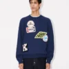 Maglione ricamato “Kenzo Badges” in misto cotone e lana Maglione ricamato “Kenzo Badges” in misto cotone e lana