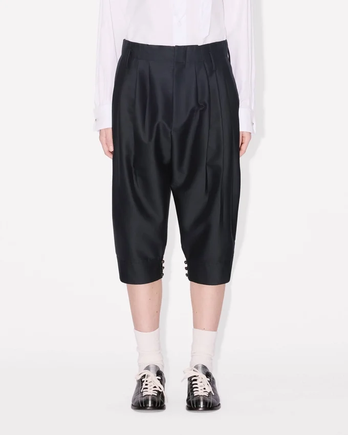 Pantaloni cropped sartoriali a pieghe in lana vergine e seta Pantaloni cropped sartoriali a pieghe in lana vergine e seta