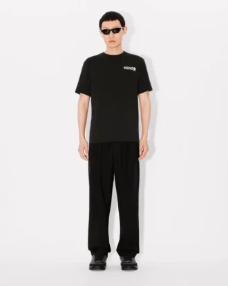 Pantaloni sartoriali a pieghe in lana vergine