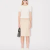 Top in pizzo elasticizzato Top in pizzo elasticizzato