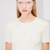 Top in pizzo elasticizzato Top in pizzo elasticizzato